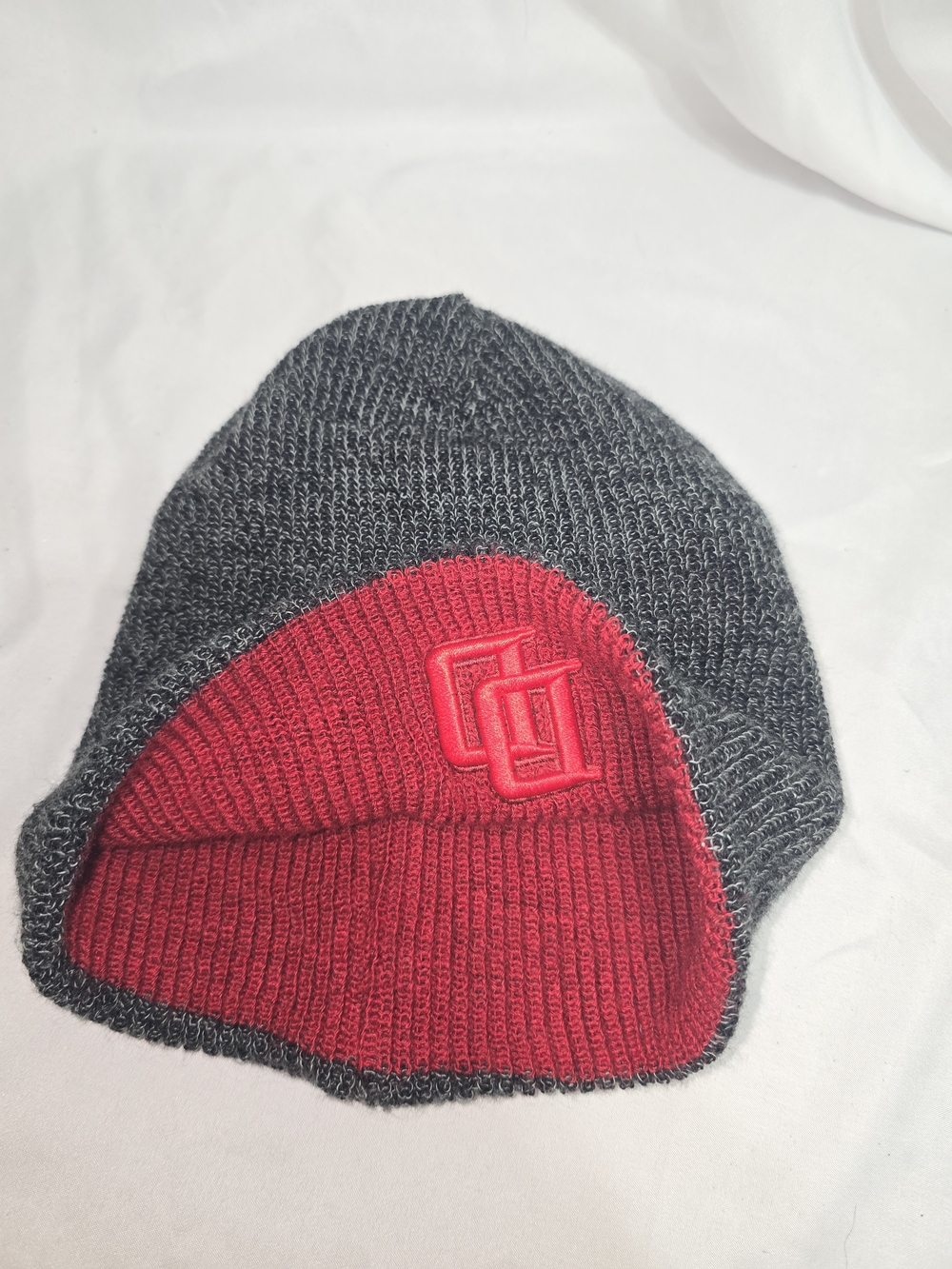 A Marvels Reversible Daredevil/Punisher Beanie.